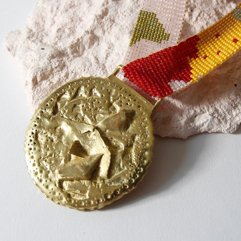 Mega brass medal