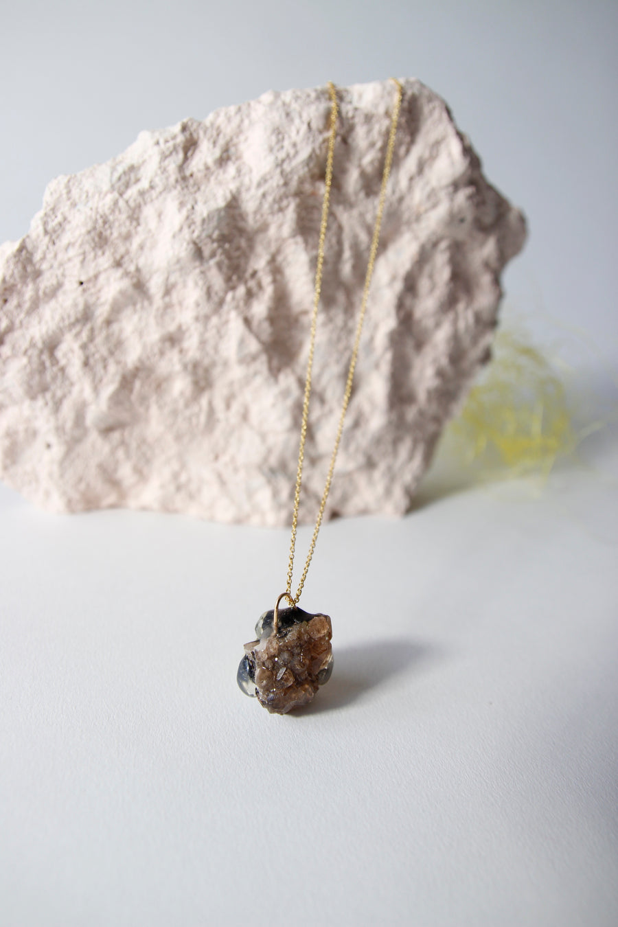 Amulet necklace in earthly wonder