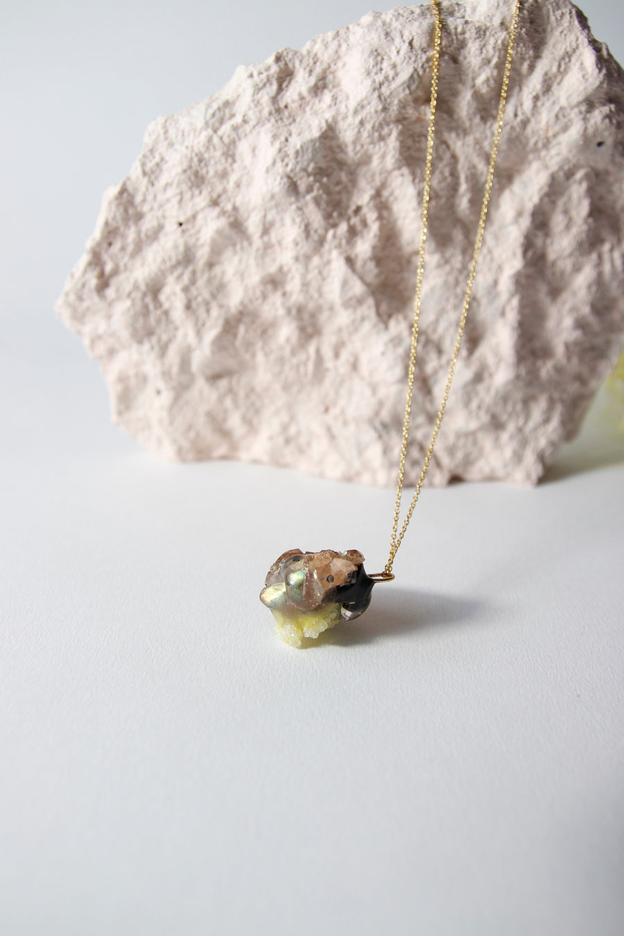 Amulet necklace in earthly wonder